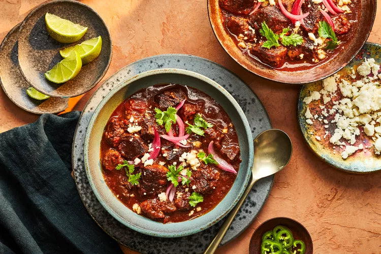 beef short rib in blue bowl with toppings
