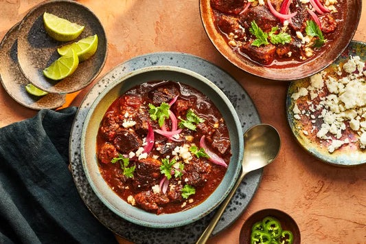 beef short rib in blue bowl with toppings